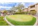 Scenic putting green in a well-maintained outdoor recreational area with lush greenery at 16013 S Desert Foothills Pkwy # 2055, Phoenix, AZ 85048