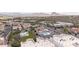 Aerial shot of community with a community pool and lush desert surroundings at 16616 E Gunsight Dr # 114, Fountain Hills, AZ 85268