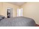 Cozy bedroom featuring a comfortable bed, closet and neutral walls providing a warm and inviting atmosphere at 16616 E Gunsight Dr # 114, Fountain Hills, AZ 85268