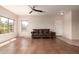 Bright living room featuring tile floors, and a ceiling fan at 16616 E Gunsight Dr # 114, Fountain Hills, AZ 85268