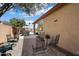 Cozy brick patio with furniture; a charming outdoor space for relaxation at 16876 W Stevenage St, Surprise, AZ 85374