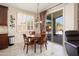 Cozy breakfast nook with sliding glass doors to the outdoor patio at 16876 W Stevenage St, Surprise, AZ 85374