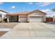 Attractive single-Gathering home with a spacious two-car garage, desert landscaping, and a well-maintained front yard at 16876 W Stevenage St, Surprise, AZ 85374