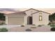 Charming single-story home featuring a terracotta tile roof, neutral stucco, and desert landscaping at 18007 W Camino De Oro --, Surprise, AZ 85387