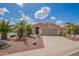 Charming single-Gathering home with a well-maintained lawn, mature trees, and inviting curb appeal at 1806 N 108Th Ave, Avondale, AZ 85392