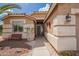 Inviting exterior with a landscaped walkway leading to the front door and desert-style garden at 1806 N 108Th Ave, Avondale, AZ 85392