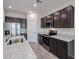 Modern kitchen with stainless steel appliances and granite countertops at 18171 W Daley Ln, Surprise, AZ 85387