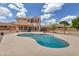 Stunning backyard with a refreshing pool, manicured landscaping, and a spacious patio at 18601 N 16Th Pl, Phoenix, AZ 85024