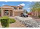 Charming two-story home featuring a well-manicured front yard and a two car garage at 18601 N 16Th Pl, Phoenix, AZ 85024