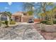 Lovely two-story home featuring a well-maintained front yard and a two car garage at 18601 N 16Th Pl, Phoenix, AZ 85024