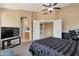 Spacious main bedroom with ceiling fan, and ensuite bath and large closet at 18601 N 16Th Pl, Phoenix, AZ 85024