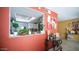 Pass through view to kitchen, featuring plants, decor, and white cabinetry at 18829 N 23Rd Ave, Phoenix, AZ 85027