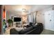 Comfortable living room with a large sectional sofa, fireplace, and neutral decor at 18829 N 23Rd Ave, Phoenix, AZ 85027