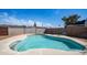 Backyard pool area enclosed by brick walls, perfect for relaxing and enjoying the outdoor space at 18829 N 23Rd Ave, Phoenix, AZ 85027