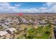 A beautiful community with common green space, playground, sidewalks, and neighborhood streets with a pin drop at 24127 N 166Th Ct, Surprise, AZ 85387