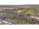 This image shows the community with a business park, baseball fields and desert vegetation on the horizon at 24127 N 166Th Ct, Surprise, AZ 85387
