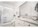 Lovely bright bathroom with granite countertops, shower, and updated fixtures and hardware at 24127 N 166Th Ct, Surprise, AZ 85387