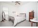 Comfortable bedroom featuring neutral decor, a ceiling fan, and plenty of natural light at 24127 N 166Th Ct, Surprise, AZ 85387