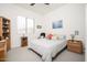 Cozy bedroom with natural light, nice carpet, and ceiling fan at 24127 N 166Th Ct, Surprise, AZ 85387
