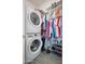 Conveniently placed washer and dryer inside a walk-in closet at 24127 N 166Th Ct, Surprise, AZ 85387