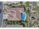 Aerial top-down home view with a swimming pool and well-manicured desert landscaping; capturing outdoor living at 26521 N 114Th Pl, Scottsdale, AZ 85255