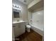 Neat bathroom with a new sink and shower/tub combination on a wood floor at 2666 N 43Rd Ave # C, Phoenix, AZ 85009