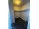 This spacious closet offers ample storage with shelving and a roll of carpet at 2666 N 43Rd Ave # C, Phoenix, AZ 85009