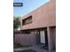 Two-story townhome featuring a stucco exterior and a well-kept walkway leading to the front door at 2666 N 43Rd Ave # C, Phoenix, AZ 85009