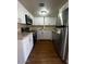 Modern kitchen boasts stainless appliances, granite counters, and ample cabinet space at 2666 N 43Rd Ave # C, Phoenix, AZ 85009
