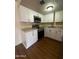 Modern kitchen boasts stainless appliances, granite counters, and ample cabinet space at 2666 N 43Rd Ave # C, Phoenix, AZ 85009