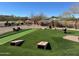 Enjoy outdoor fun in the community game area, perfect for gatherings and recreation with cornhole and other lawn games at 27315 N 83Rd Dr, Peoria, AZ 85383