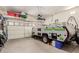 Garage features a large storage space and room for recreational vehicle with overhead storage at 27315 N 83Rd Dr, Peoria, AZ 85383
