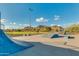 Skate park with ramps and obstacles, set against a backdrop of scenic mountain views at 27315 N 83Rd Dr, Peoria, AZ 85383