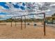 Playground featuring a swing set with neighborhood homes in the background, perfect for outdoor fun at 27315 N 83Rd Dr, Peoria, AZ 85383