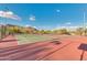 Well-maintained tennis courts with mountain views, perfect for active community members at 27315 N 83Rd Dr, Peoria, AZ 85383