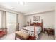 Bedroom featuring a patterned bedspread, two side tables and a window offering natural light at 28071 N Superior Rd, San Tan Valley, AZ 85143