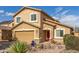 Charming two-story home with a red front door and a well-kept desert-style landscaped front yard at 28071 N Superior Rd, San Tan Valley, AZ 85143