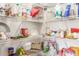 Walk-in pantry features metal racking and well-stocked shelves with food and kitchenware at 28071 N Superior Rd, San Tan Valley, AZ 85143