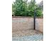 Fenced in backyard featuring brick walls and pavers at 3022 N 32Nd St # 40, Phoenix, AZ 85018
