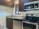 Well-equipped kitchen with stainless steel appliances, granite countertops, and ample cabinet space at 3022 N 32Nd St # 40, Phoenix, AZ 85018