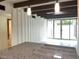 The kitchen boasts modern pendant lighting, dark cabinets, stainless appliances, and an adjacent living area at 3022 N 32Nd St # 40, Phoenix, AZ 85018