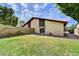 A lush backyard boasts a well-maintained lawn, brick pavers, and a privacy fence, perfect for outdoor enjoyment at 3154 E Clarendon Ave, Phoenix, AZ 85016