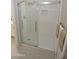 Modern bathroom featuring a frameless glass shower with sleek hardware and white subway tile surround at 3154 E Clarendon Ave, Phoenix, AZ 85016