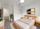 Serene main bedroom with a king bed, TV, and closet with sliding doors at 32341 N Union St, San Tan Valley, AZ 85143