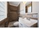 Modern bathroom with shower, wood-look tile, updated fixtures and plenty of natural light at 3245 N 43Rd N Ave, Phoenix, AZ 85031