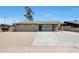 Charming single-story home with a large driveway and low-maintenance landscaping at 3245 N 43Rd N Ave, Phoenix, AZ 85031