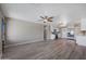 Open concept living room featuring vinyl flooring that opens to the kitchen at 3245 N 43Rd N Ave, Phoenix, AZ 85031