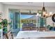 Bright dining room with view of outdoor living area at 33275 N 132Nd Ave, Peoria, AZ 85383
