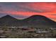Community clubhouse nestled in desert landscape with vibrant sunset views at 33275 N 132Nd Ave, Peoria, AZ 85383