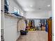 Spacious walk-in closet with ample storage space for clothes and accessories, and well-lit by recessed lighting and natural light at 33275 N 132Nd Ave, Peoria, AZ 85383